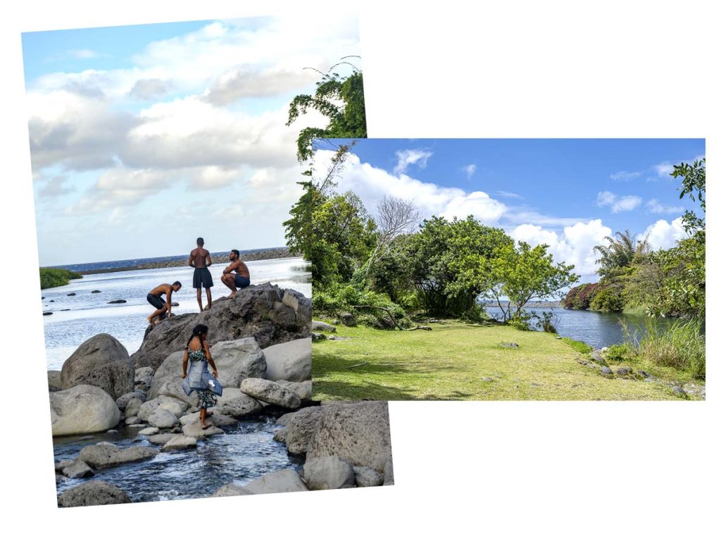 Bassin bleu in Saint-Benoît - People stand on rocks in the basin and have a picnic