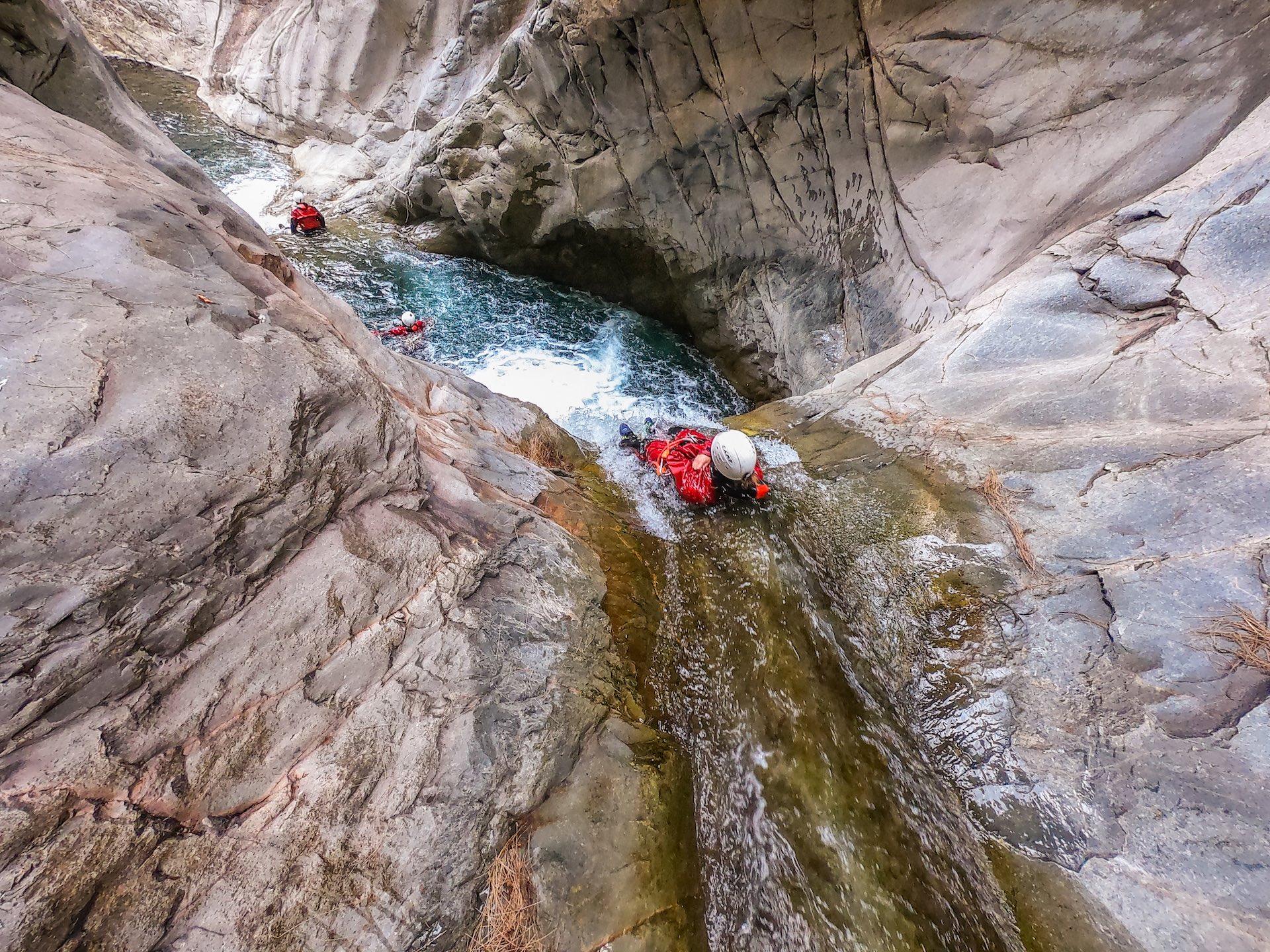 Person sliding in the canyon of Trou Blanc