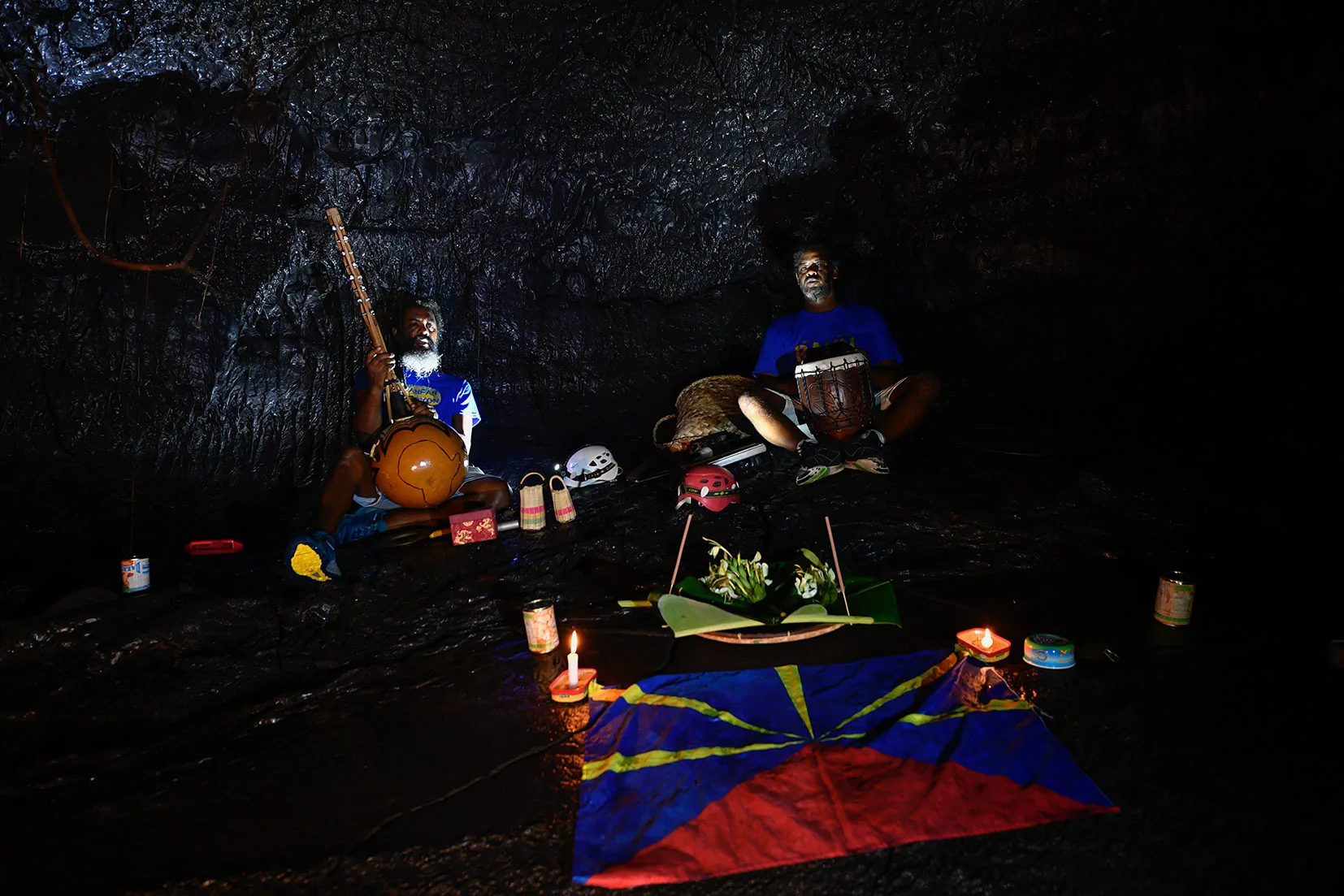 maloya musicians in a lava tunnel