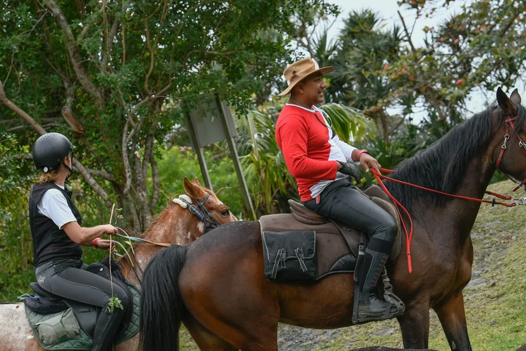 Man and woman on horses in Saint-André