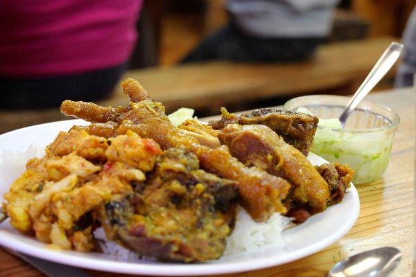 Reunionese cuisine - plate of chicken carry with rougail.