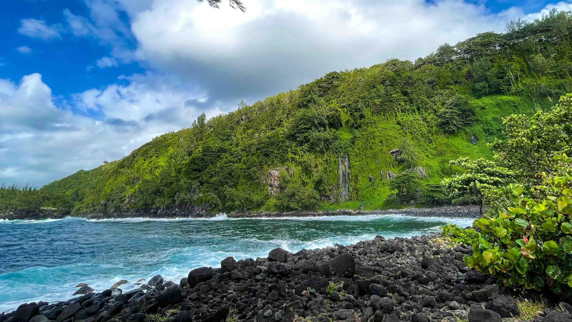 Sea and mountain photos at Anse des cascades in Sainte-Rose