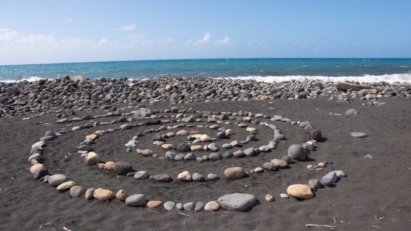 Black sand beach in Bras-Panon